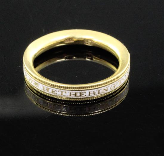 A George III 22ct gold ans white enamel mourning band